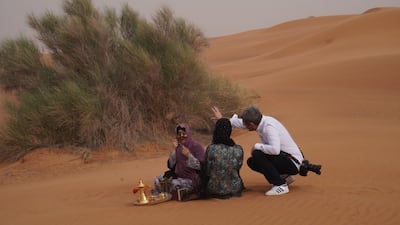 Students from Zayed University work alongside French photographer Philip Ducap. Photo: Bassam Freiha Art Foundation