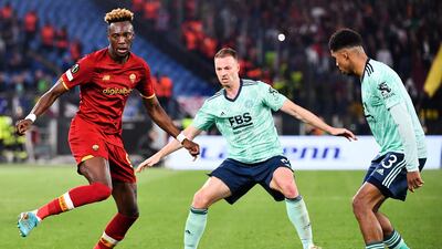 Roma forward Tammy Abraham fights for the ball with Leicester's Jonny Evans and Wesley Fofana. AFP