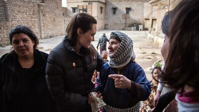 Angelina Jolie met displaced Iraqis who are members of the minority Christian community, living in an abandoned school in Al Qosh, northern Iraq on January 26. Reuters / UNHCR/Andrew McConnell/Handout via Reuters