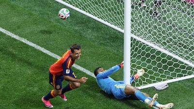 Mikel Oyarzabal scores his team's third goal against Saudi Arabia. AFP