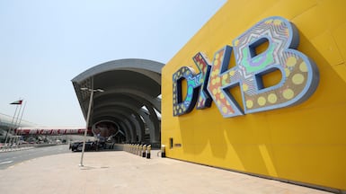 Dubai International Airport is focusing on the use of biometrics, AI and technology to funnel more people through its gates more quickly. Chris Whiteoak / The National