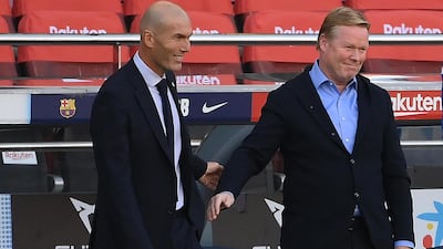 Real Madrid's coach Zinedine Zidane and Barcelona manager Ronald Koeman fac unceryain futures. AFP