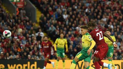 Liverpool striker Divock Origi scores his team's fourth goal. AFP