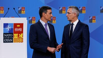 Nato Secretary General Jens Stoltenberg and Spanish Prime Minister Pedro Sanchez visit the main news conference room of the defence alliance summit venue in Madrid on Thursday. Reuters