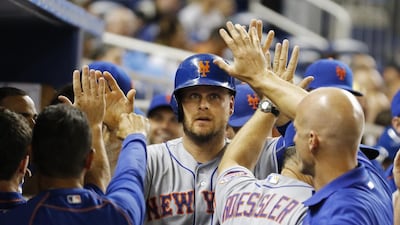 Lucas Duda, centre, is just one of the Mets who has suddenly found his batting stroke to propel New York to the top of the National League East standings. Joe Skipper / AP Photo