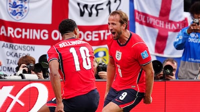 England's Harry Kane (right) celebrates scoring their side's second goal of the game with Jude Bellingham during the FIFA World Cup Group L match at New York New Jersey Stadium, East Rutherford. PA