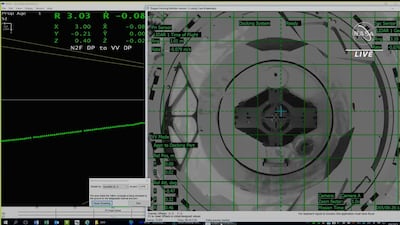 The view of the ISS docking port from inside the Dragon capsule.