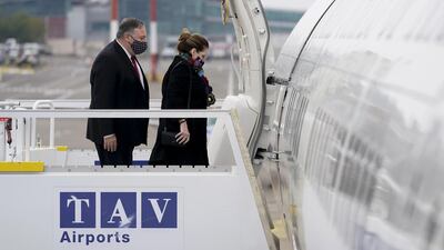 US Secretary of State Mike Pompeo (L) and his wife Susan board a plane to leave for Jerusalem, at Tbilisi International Airport in Tbilisi, on November 18, 2020. AFP