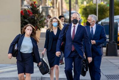 Theranos founder Elizabeth Holmes arrives at the Robert F Peckham Federal Building with her defence team. AFP