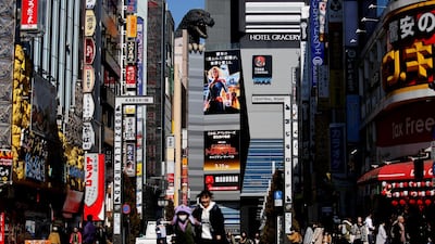 The head of Godzilla is seen on a building of Toho Cinema in Tokyo, Japan. Reuters