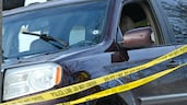 The car, with a bullet hole in the windscreen, in which a woman was shot dead by an Immigration and Customs Enforcement agent in Minneapolis. EPA