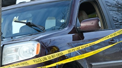 The car, with a bullet hole in the windscreen, in which a woman was shot dead by an Immigration and Customs Enforcement agent in Minneapolis. EPA