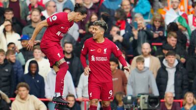 Darwin Nunez celebrates with Roberto Firmino after scoring the second goal for Liverpool. AP