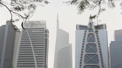 The sun struggles to break through over Dubai Marina. Chris Whiteoak / The National