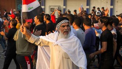 Iraqis demonstrate outside the Basra Governorate's building in the southern city of Basra. The United Nations' top official in Iraq and the country's most senior cleric urged authorities to get "serious" about reforms after anti-government demonstrations that have left hundreds dead. AFP
