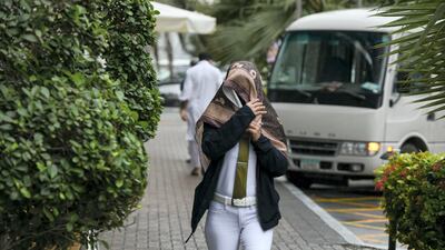 Light rain falls over Abu Dhabi on Sunday. Khushnum Bhandari for The National