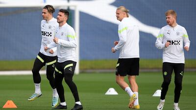 Manchester City players are put through their paces ahead of the Champions League clash with Borussia Dortmund. AFP