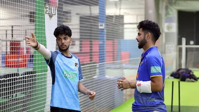 Uddish Suri, left, hopes to play for the UAE with brother Tanish