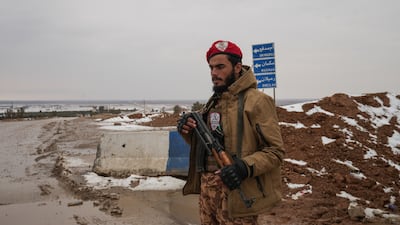 A Syrian soldier on the front line with the Syrian Democratic Forces, nine kilometres from the city of Hasakah. EPA