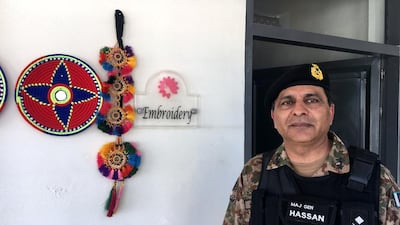 Major General Hassan Azhar Hayat is pictured outside the embroidery classroom at the newly-built school in Miranshah. Colin Freeman for The National