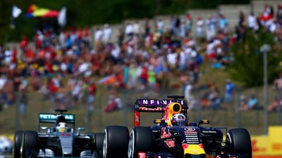 Daniel Ricciardo has his Red Bull Racing F1 car ahead of Lewis Hamilton's Mercedes . Clive Mason / Getty Images