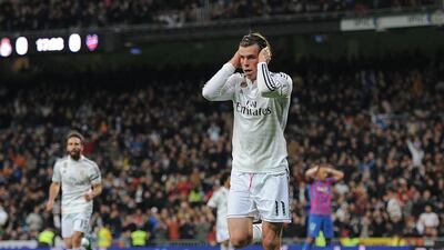 Gareth Bale of Real Madrid celebrates after scoring Real's opening goal during their Primera Liga match against Levante at Estadio Santiago Bernabeu on March 15, 2015 in Madrid, Spain. (Photo by Denis Doyle/Getty Images)