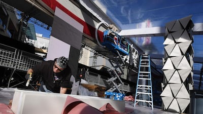 A man works in the red carpet area as preparations for the 91st Academy Awards take place in Hollywood. AFP