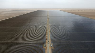 Aerial view of the Mohammed bin Rashid Al Maktoum Solar Park Phase 5 in Dubai, operated by Dewa. Pawan Singh / The National