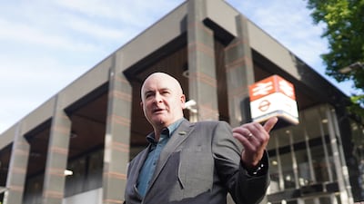 RMT leader Mick Lynch on a picket line outside Euston station. PA