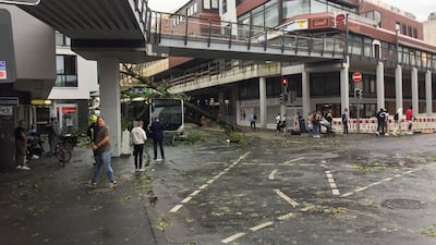 People walk on the streets following the tornado. Reuters