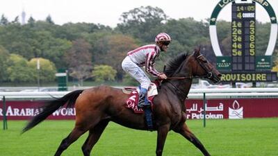 Olivier Peslier rides Cirrus Des Aigles to victory in the Qatar Prix Dollar at Longchamp.