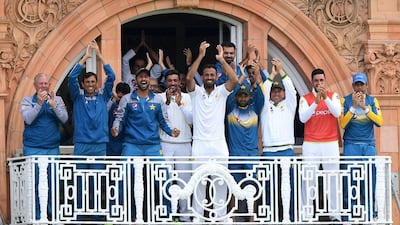 The Pakistan balcony celebrates as Misbah-ul-Haq of Pakistan reaches his century during day one of the 1st Investec Test match between England and Pakistan at Lord's Cricket Ground on July 14, 2016 in London, England. (Photo by Stu Forster/Getty Images)