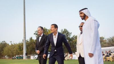Bear Grylls throws in the ball with HE Philip Parham (left), Ron Wahid of RJI Capital, and HH Sheikh Shakhboot bin Nahyan bin Mubarak Al Nahyan. Photo by Sam Churchill