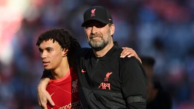 Klopp celebrates with defender Trent Alexander-Arnold. EPA