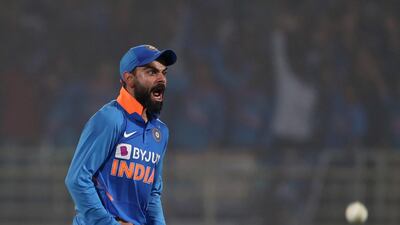 India captain Virat Kohli celebrates the wicket of West Indies' Shimron Hetmyer in Visakhapatnam. AFP