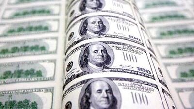 Some experts say it could be safe to invest in gold or park money in cash in uncertain times. Andrew Harrer / Bloomberg News