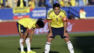 Radamel Falcao, right, is expected to join international teammate Jaun Cuadrado, left, at Chelsea this summer. Natacha Pisarenko / AP Photo