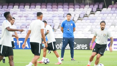 Al Ain coach Vladimir Ivic oversees training at Hazza bin Zayed Stadium. Pawan Singh for The National
