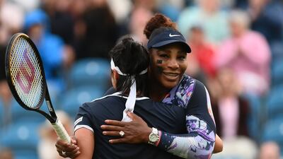 Serena Williams embraces Ons Jabeur of Tunisia after her doubles win in Eastbourne. Getty