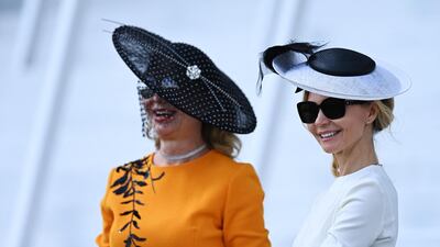 Racegoers during the second day of the Epsom Derby Festival. AFP