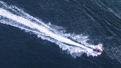 Jet skiers at Al Mamzar beach.
