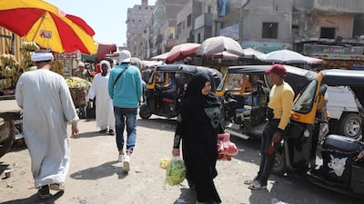 Egyptians at a local market in the Bolaq district in Giza, Egypt. EPA