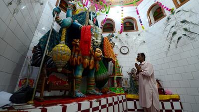 A Hindu man prays at the Kali Mata temple in Umerkot, Sindh province. Mobeen Ansari