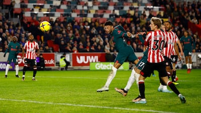 Alex Oxlade-Chamberlain heads home for Liverpool to make it 2-1. Reuters