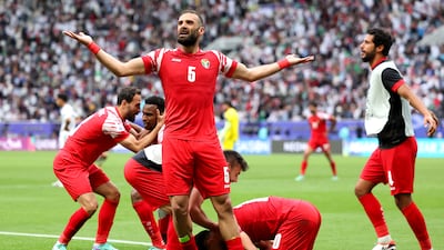Yazan Al Arab of Jordan celebrates scoring his team's second goal. Getty Images