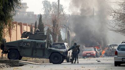 Afghan police officers arrive at the site of a blast and gun fire in Jalalabad, Afghanistan January 24, 2018.REUTERS/Parwiz