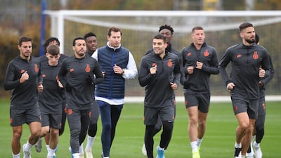 Chelsea players go through their paces during a training session at Cobham. EPA