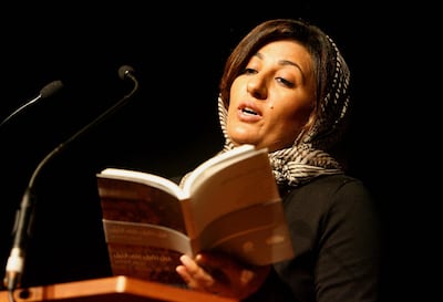Nujoom Alghanem reading poetry at the Southbank Centre in London. Stephen Lock / The National