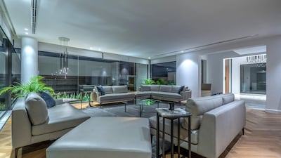 Herringbone floors add an elegant touch.