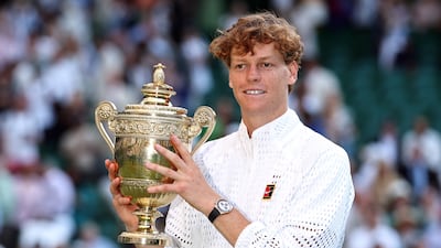 Jannik Sinner of Italy celebrates with the Wimbledon trophy after winning the men's singles final against Alexander Zverev at the All England Club. EPA